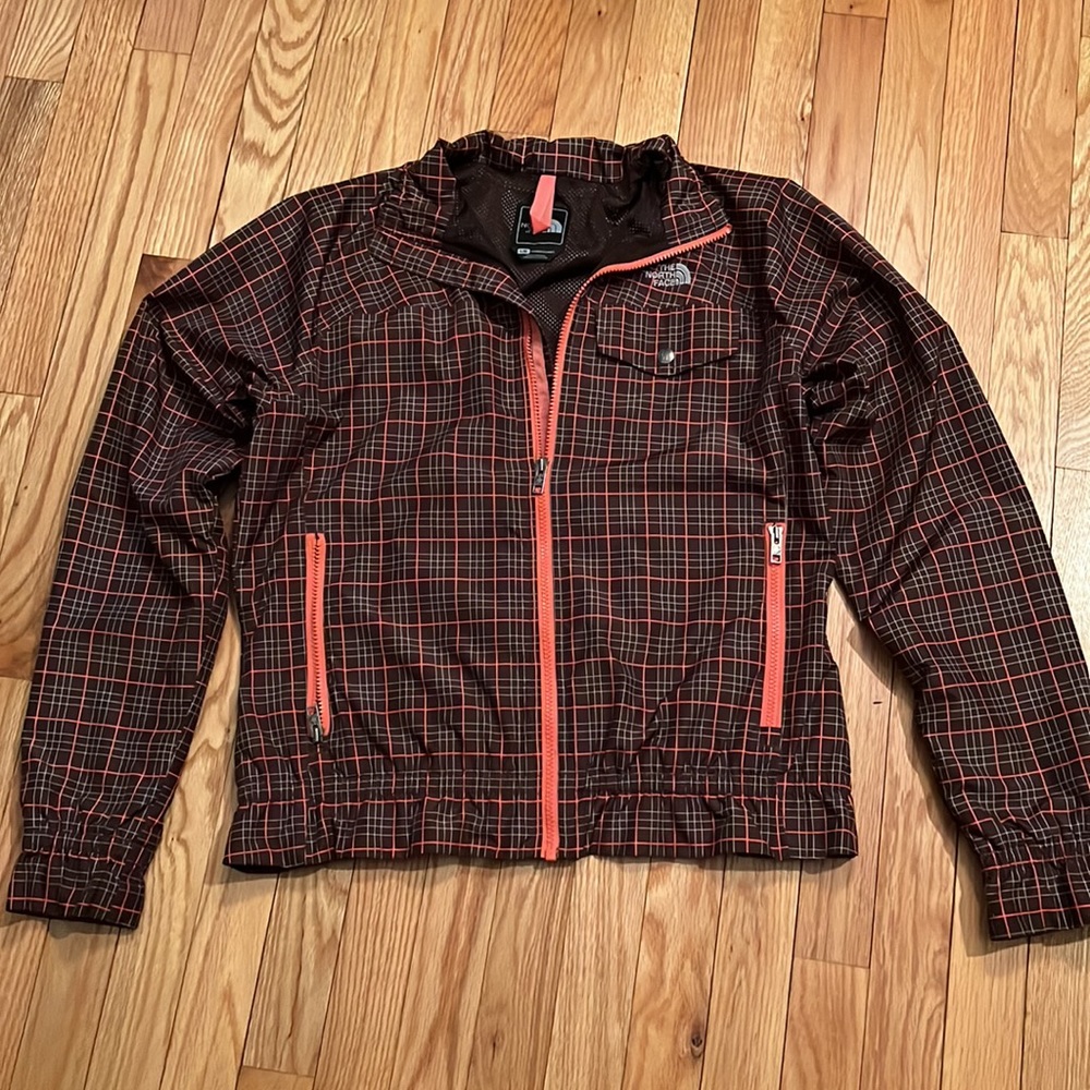 The North Face Jacket, brown & orange plaid. Zippered pockets. Women’s size L